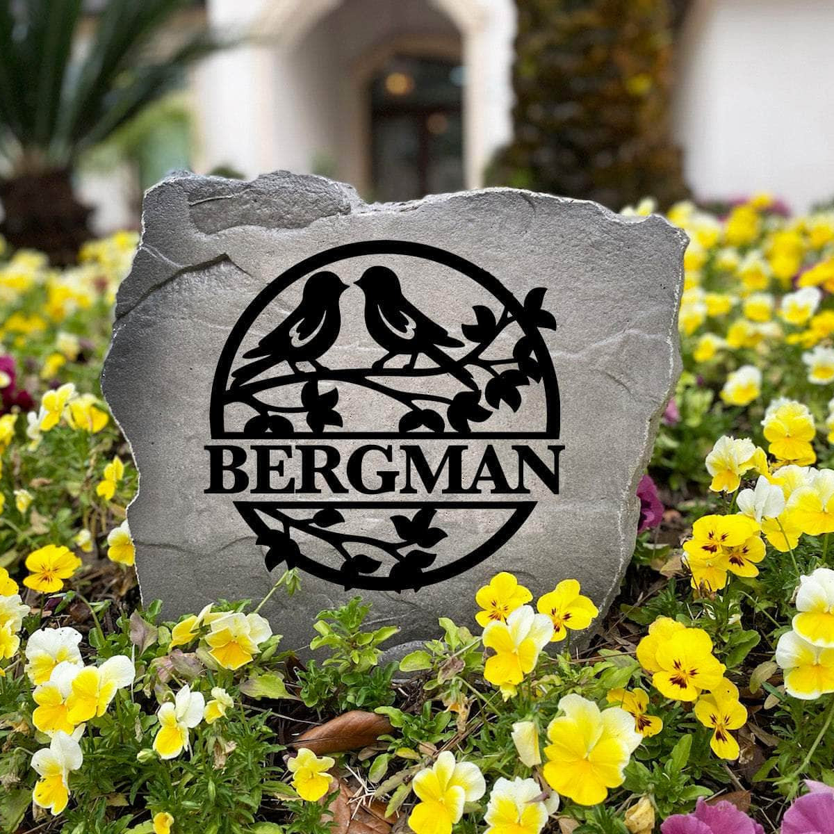 Personalized Love Birds Monogram Stone handcrafted in the USA with elegant bird artwork and custom engraving. This decorative outdoor stone enhances flower beds, walkways, and landscape borders with lasting beauty.