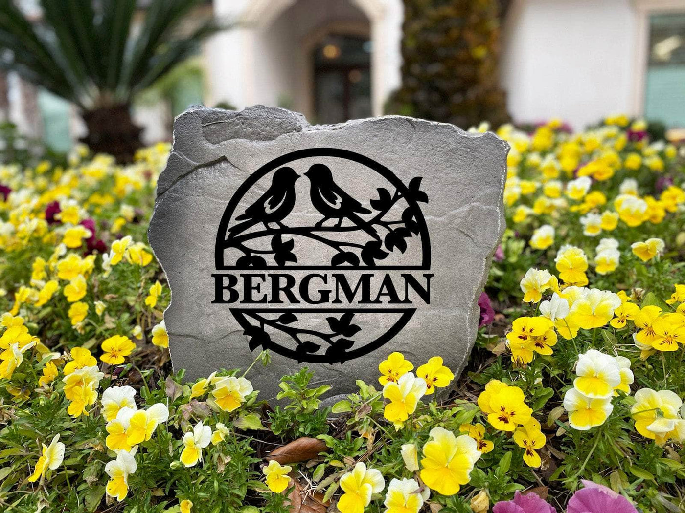 Unique personalized garden stone with love birds and an elegant monogram design.
