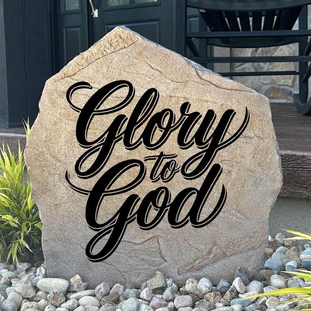 Engraved Glory To God Stone featuring an inspiring faith-based message carved directly into the stone surface. This decorative garden stone adds peaceful beauty and spiritual meaning to front yards, gardens, patios, and entryways.