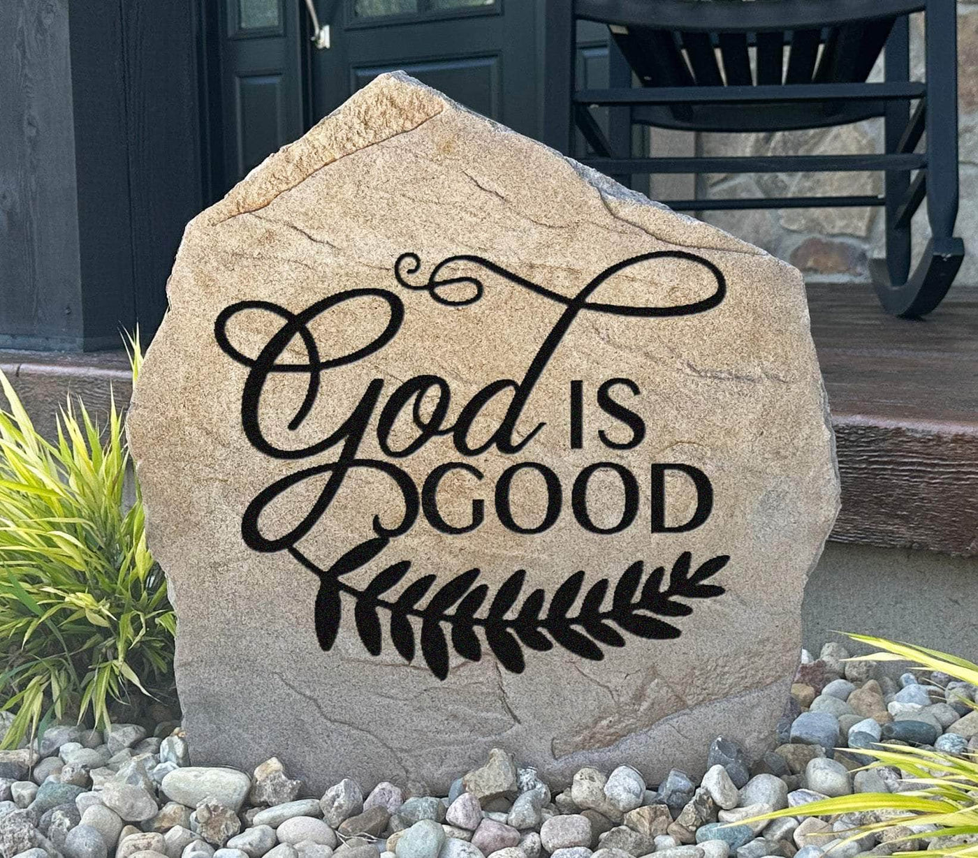 Engraved God Is Good stone with decorative vine design for garden or yard