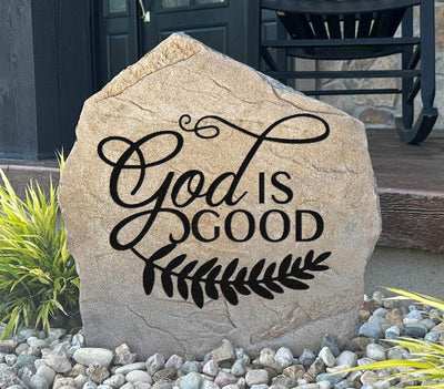 Engraved God Is Good stone with decorative vine design for garden or yard