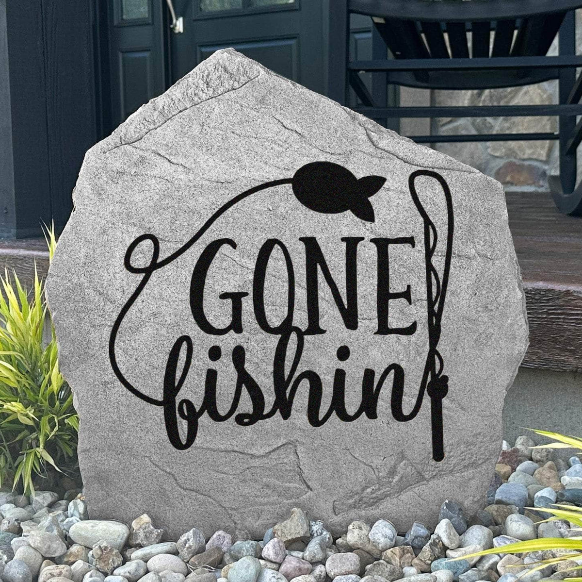 Gone Fishin' engraved stone bringing classic fishing cabin charm to lake houses, docks, gardens, and waterfront landscapes.