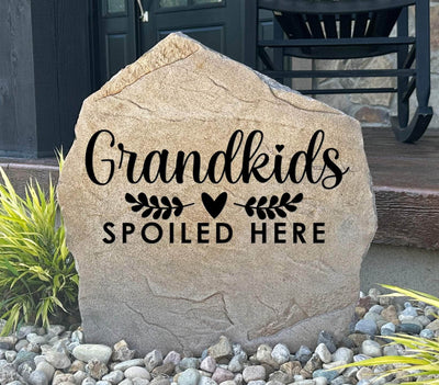Engraved stone with “Grandkids Spoiled Here” and heart design