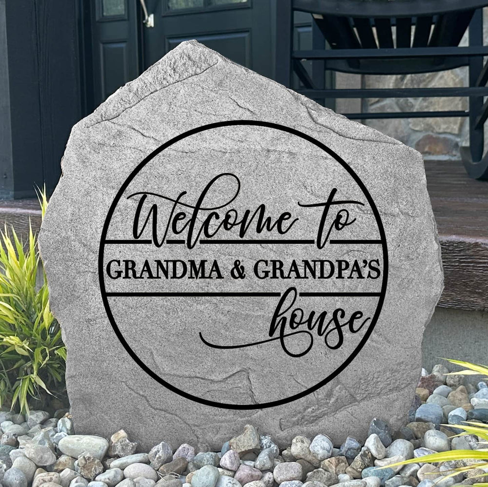 Custom Grandma & Grandpa's House Stone displayed in a landscaped flower bed, celebrating family and creating a charming focal point for walkways, porches, and outdoor living spaces.