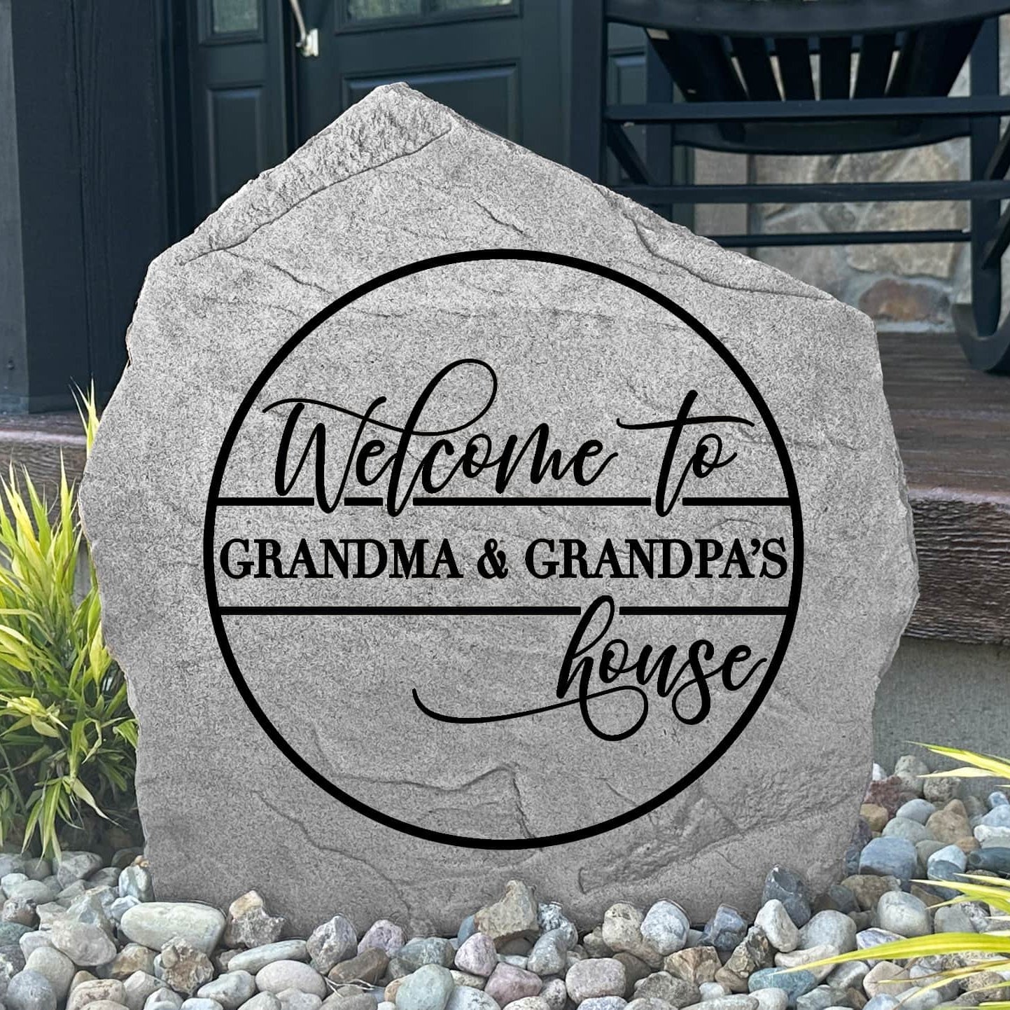 Custom Grandma & Grandpa's House Stone displayed in a landscaped flower bed, celebrating family and creating a charming focal point for walkways, porches, and outdoor living spaces.
