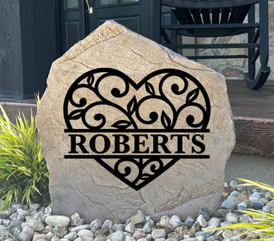 Personalized heart monogram stone with family name, perfect for garden or front porch decor.
