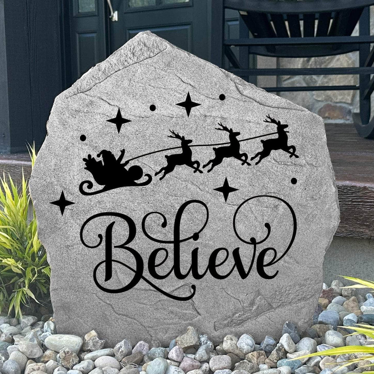 Believe Holiday Stone displayed in a beautifully decorated outdoor setting, showcasing elegant engraving and timeless craftsmanship. This festive outdoor accent creates a welcoming focal point for Christmas décor and holiday gatherings.