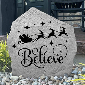 Believe Holiday Stone displayed in a beautifully decorated outdoor setting, showcasing elegant engraving and timeless craftsmanship. This festive outdoor accent creates a welcoming focal point for Christmas décor and holiday gatherings.