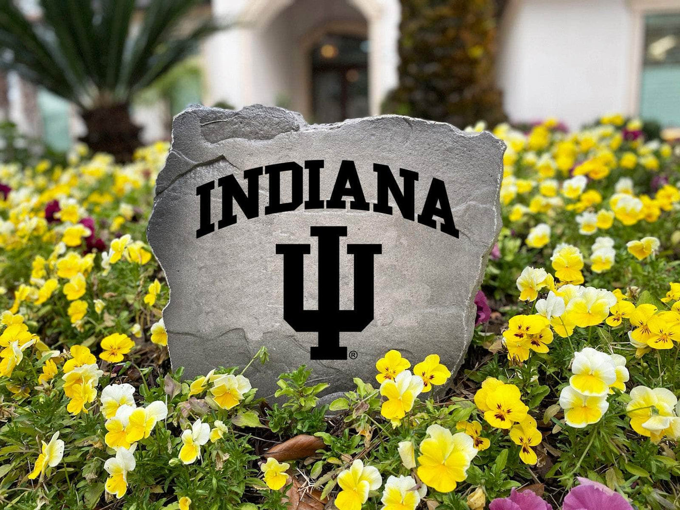 Custom rock sign featuring Indiana University emblem