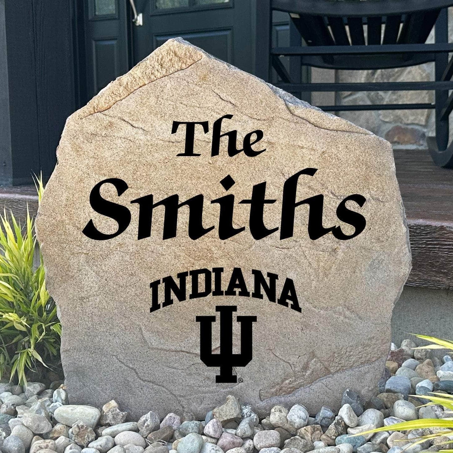 Officially licensed Indiana University Name Stone featuring a personalized family name and the iconic Indiana Hoosiers logo engraved directly into the stone surface. This custom garden stone adds school pride and curb appeal to front yards, patios, gardens, and entryways.