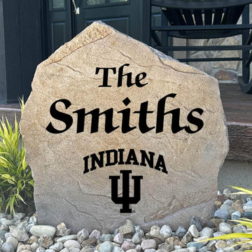 Officially licensed Indiana University Name Stone featuring a personalized family name and the iconic Indiana Hoosiers logo engraved directly into the stone surface. This custom garden stone adds school pride and curb appeal to front yards, patios, gardens, and entryways.