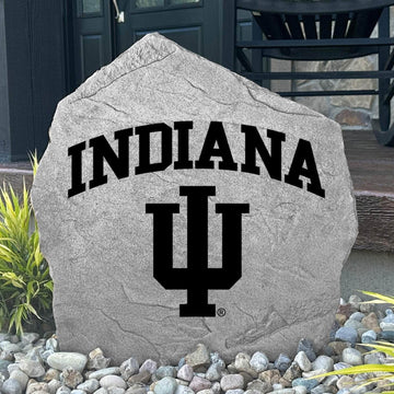 Custom Indiana Hoosiers Logo Stone displayed in a landscaped flower bed, showcasing officially licensed team artwork permanently engraved into the stone. This outdoor accent creates a beautiful focal point for alumni homes and devoted Hoosiers fans.