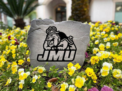 Decorative rock with JMU Duke Dog logo for outdoor display