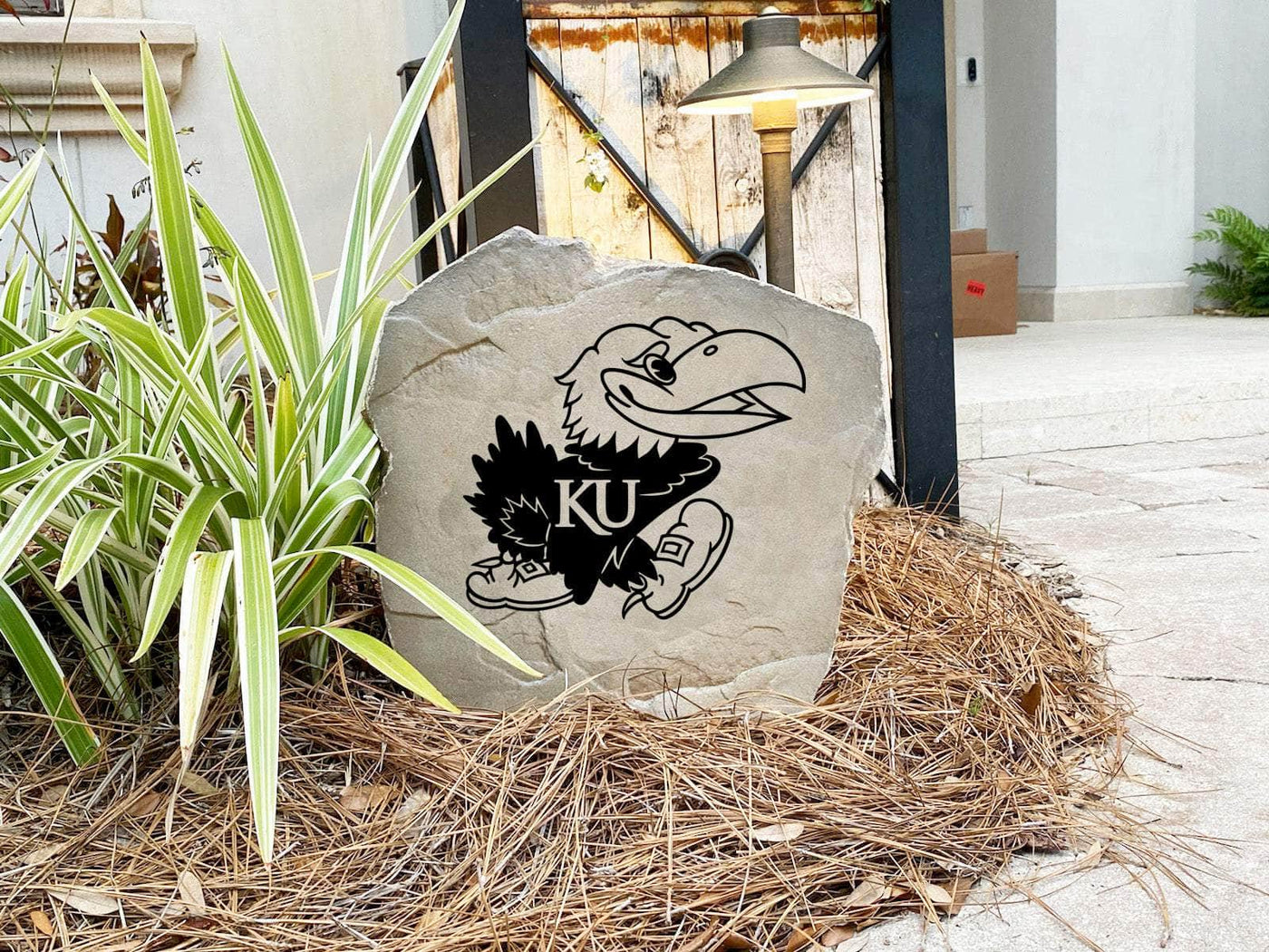 Custom landscaping stone with Kansas Jayhawks logo engraving