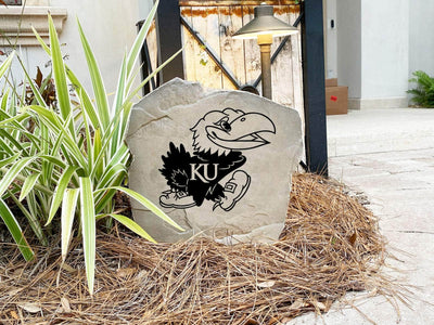 Custom landscaping stone with Kansas Jayhawks logo engraving