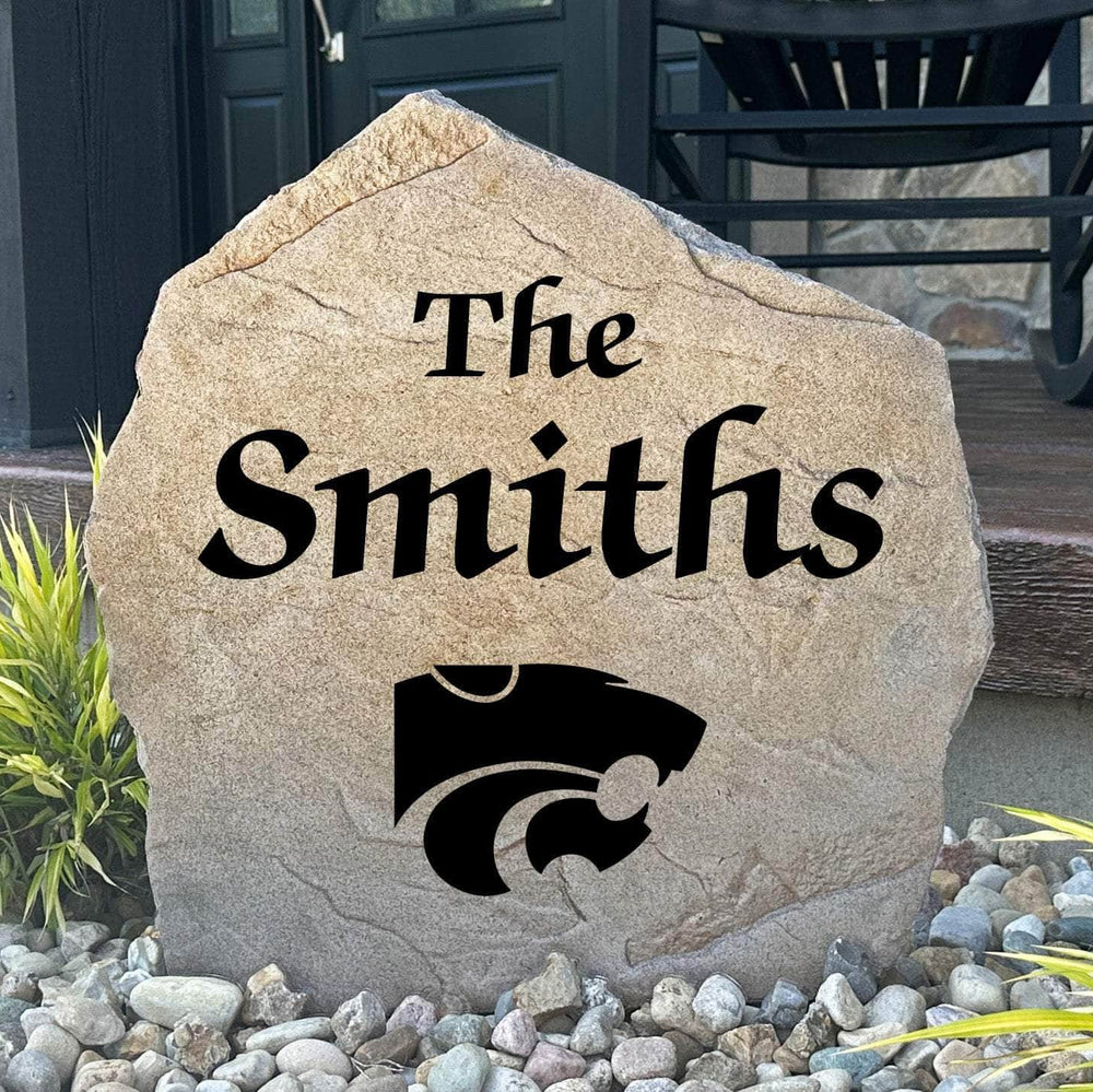 Officially licensed Kansas State University Name Stone featuring a personalized family name and the iconic Kansas State Wildcats logo engraved directly into the stone surface. This custom garden stone adds school pride and curb appeal to front yards, patios, gardens, and entryways.