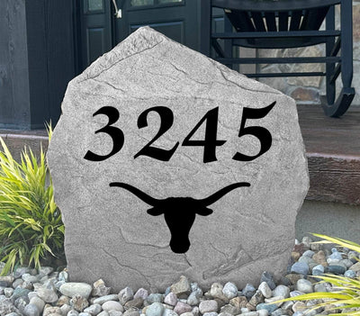 Custom yard rock featuring Longhorn logo and address