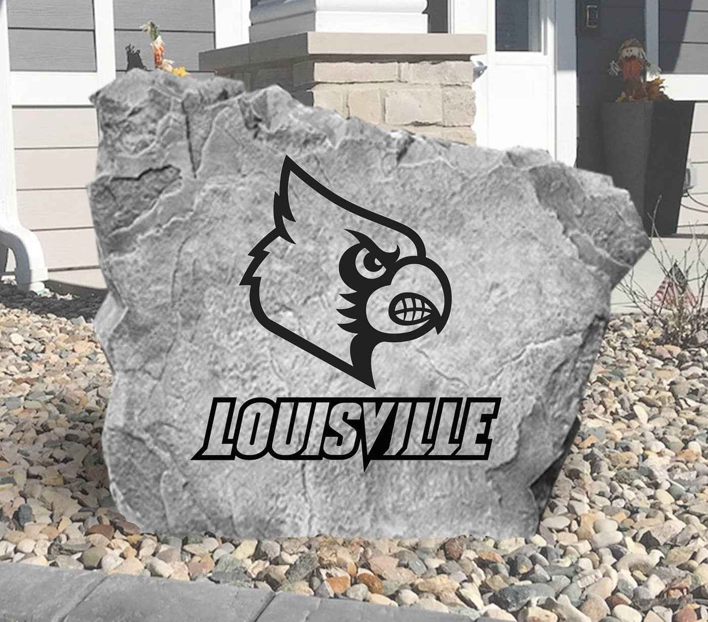 Decorative garden rock with Louisville Cardinals emblem