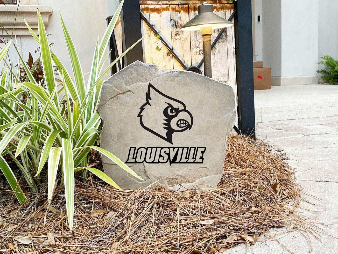 Weatherproof landscaping stone with Louisville Cardinals logo