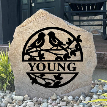 Personalized Love Birds Monogram Stone featuring a custom initial and charming bird design engraved directly into the stone surface. This decorative garden stone adds timeless elegance and curb appeal to front yards, patios, gardens, and entryways.