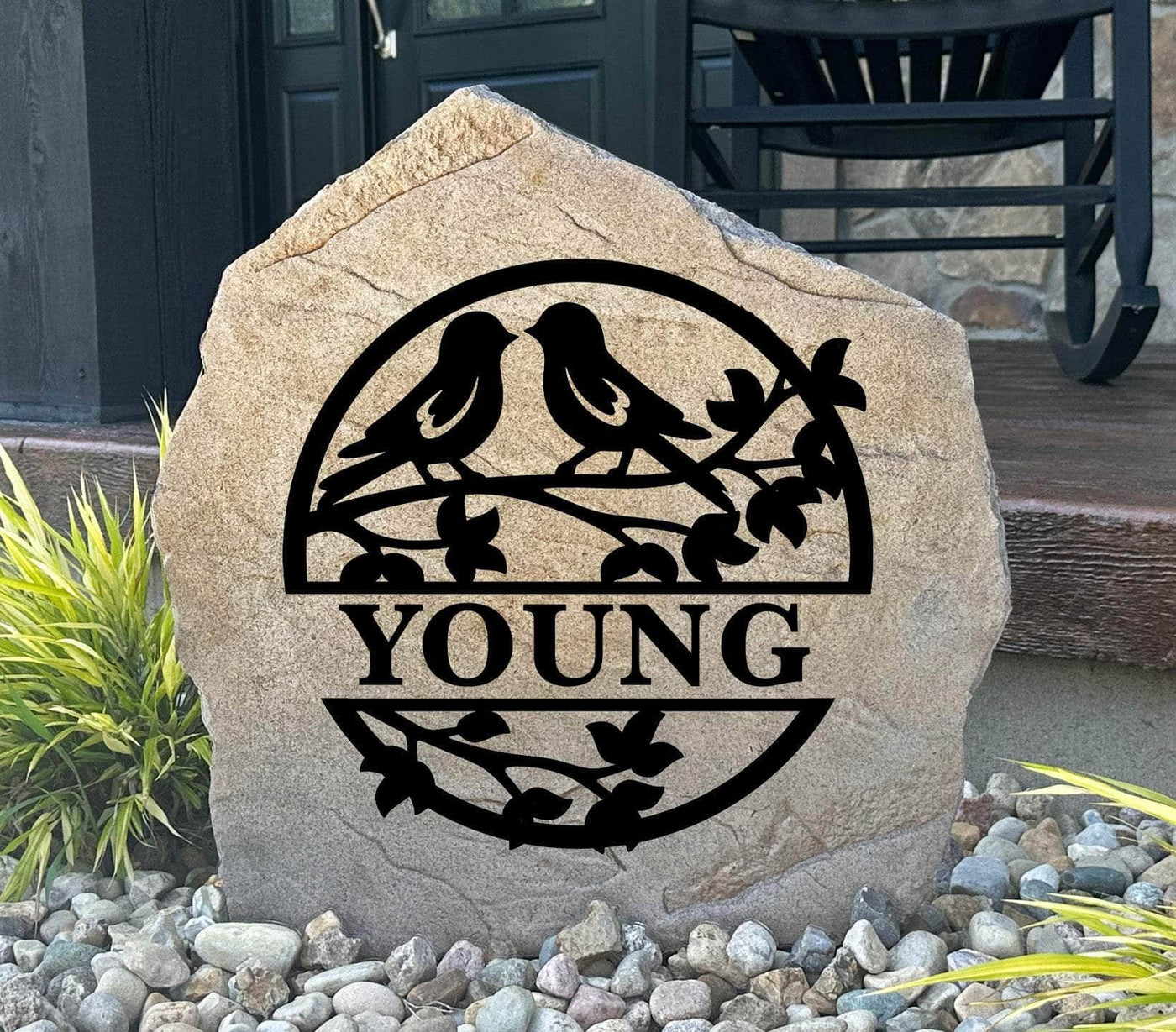 Personalized Love Birds Monogram name stone for outdoor garden decor with engraved birds and branches.