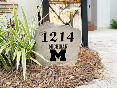 Personalized NCAA address stone for landscaping, perfect for Michigan fans.