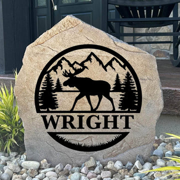 Personalized Moose Monogram Stone featuring a custom initial and majestic moose design engraved directly into the stone surface. This decorative garden stone adds rustic charm and curb appeal to cabins, front yards, patios, and entryways.