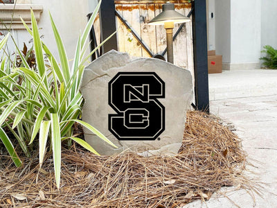 Custom stone marker with engraved NC State Wolfpack team logo