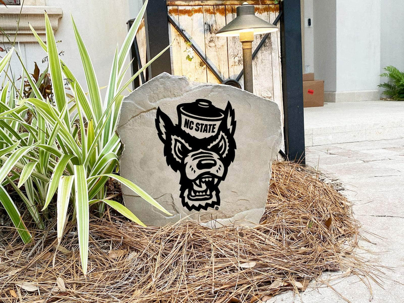 Decorative landscaping stone showcasing NC State University mascot
