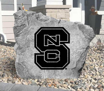Outdoor rock featuring North Carolina State University emblem