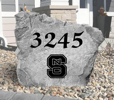 Outdoor rock with NC State Wolfpack logo engraving