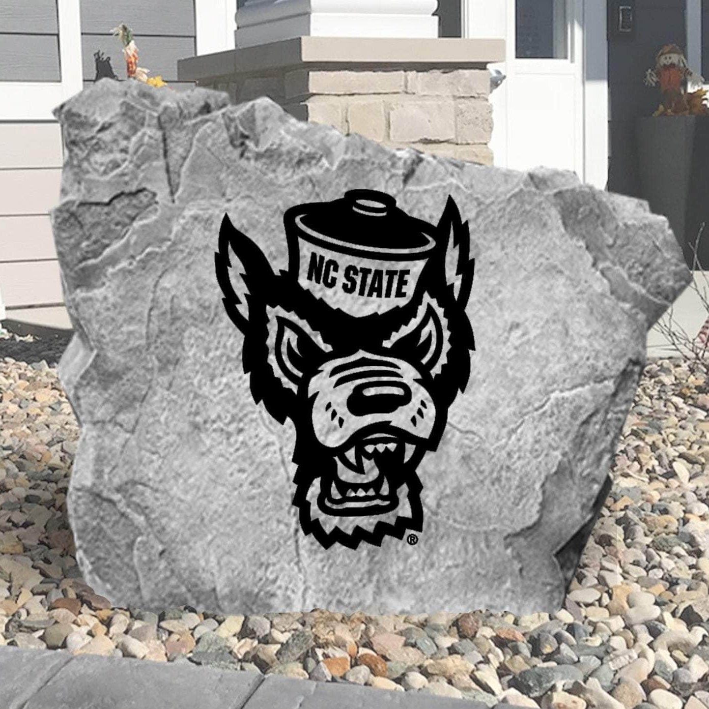 Celebrate your favorite college team with a North Carolina State University Mascot Logo Stone showcasing officially licensed Wolfpack mascot artwork. Perfect for flower beds, outdoor living spaces, porches, and landscaped yards.