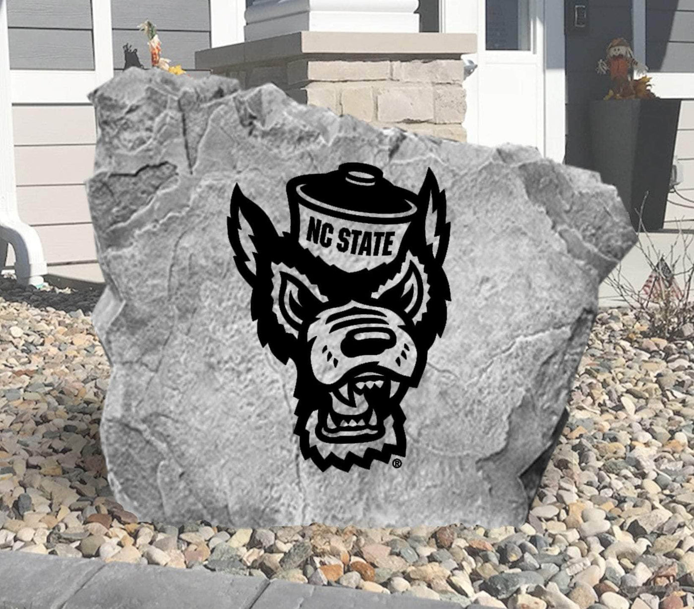 Engraved rock with NC State Wolfpack logo for outdoor display