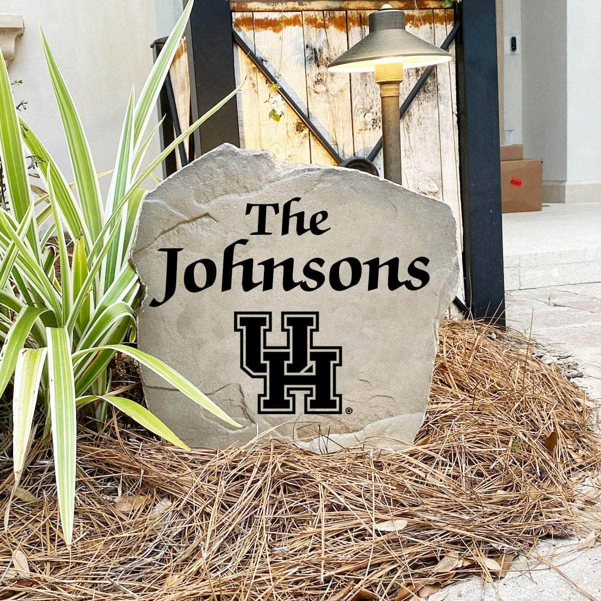 Engraved University of Houston Name Stone with a custom family name and the Houston Cougars logo, bringing collegiate spirit and timeless style to front yard landscapes, walkways, and home entrances.