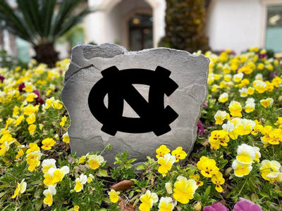 Custom engraved rock featuring the North Carolina Tar Heels logo