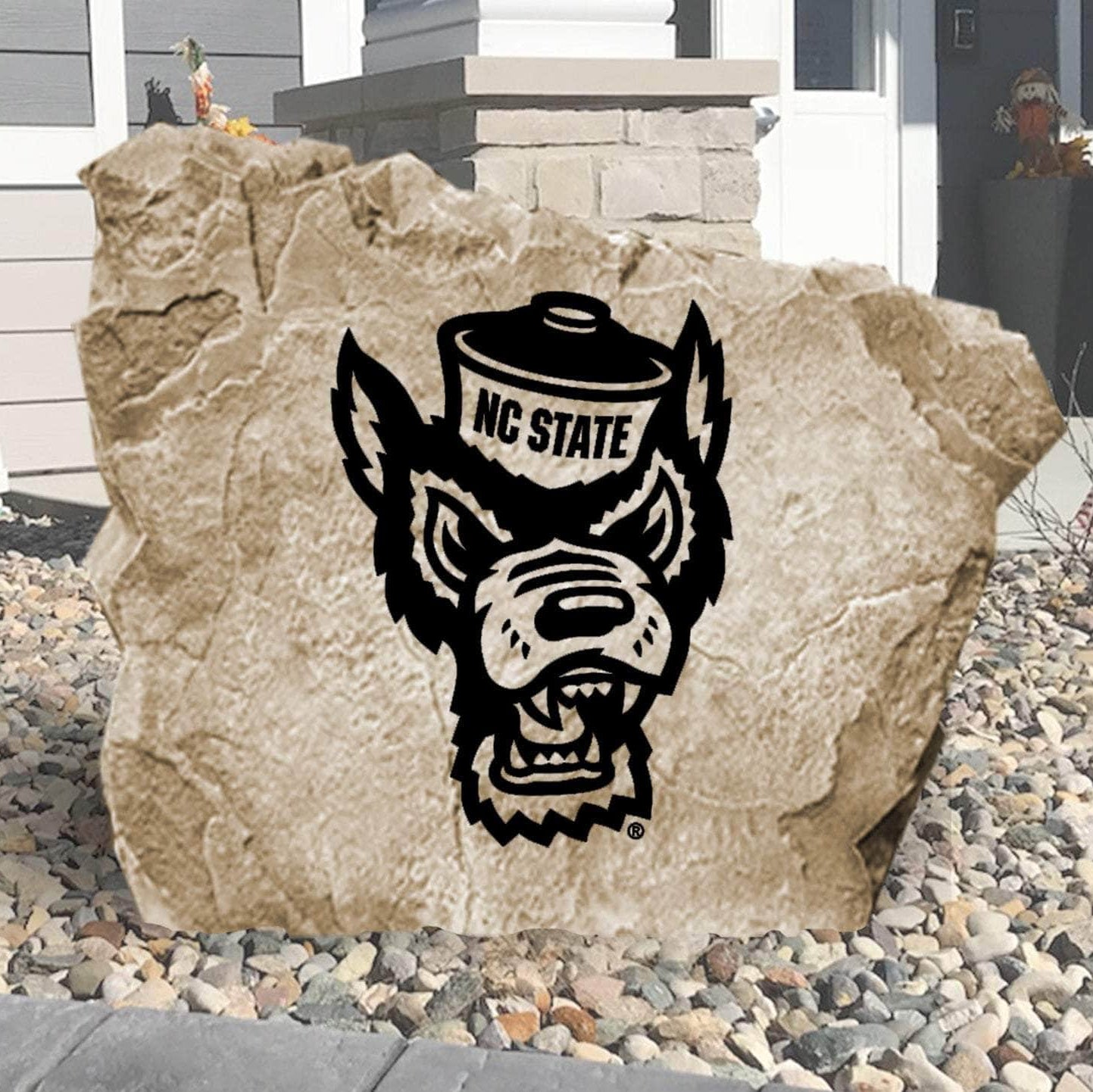 Officially licensed North Carolina State University Mascot Logo Stone featuring the iconic Wolfpack mascot logo engraved into premium stone. This decorative landscape stone brings NC State spirit to gardens, patios, walkways, and front entrances.