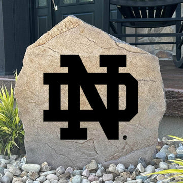 Officially licensed University of Notre Dame Logo Stone featuring the iconic Notre Dame Fighting Irish logo engraved directly into the stone surface. This decorative garden stone adds school spirit and curb appeal to front yards, patios, gardens, and entryways.