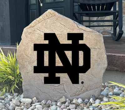 Notre Dame logo stone engraved with the iconic interlocking ND, perfect for outdoor display.