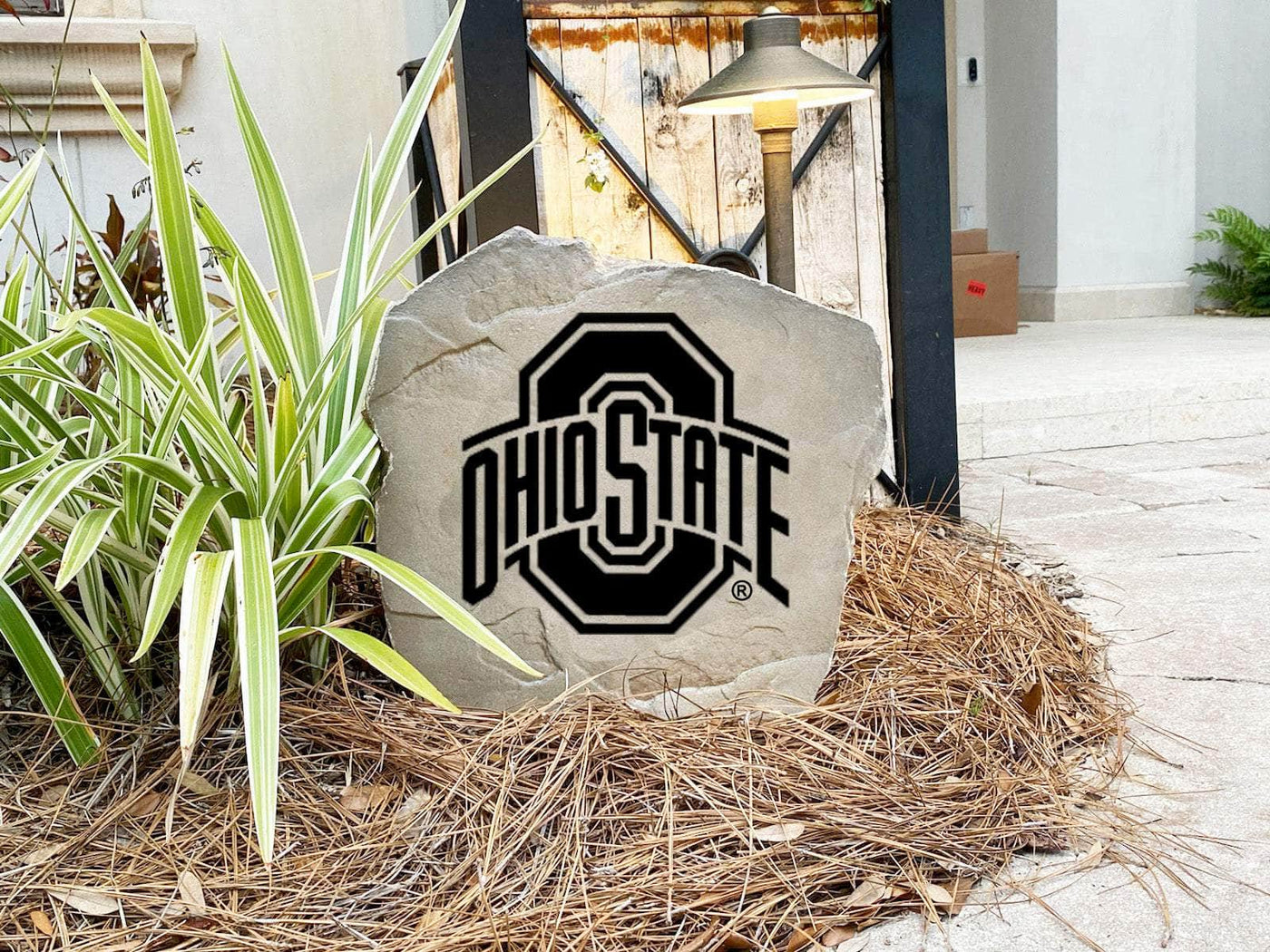 Outdoor stone featuring Ohio State Buckeyes emblem