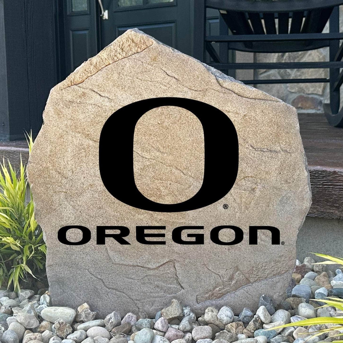 Officially licensed University of Oregon Logo Stone featuring the iconic Oregon Ducks logo engraved directly into the stone surface. This decorative garden stone brings school spirit and lasting curb appeal to front yards, patios, gardens, and entryways.