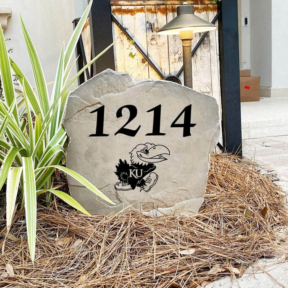 Handcrafted University of Kansas Address Stone proudly made in the USA with deeply engraved house numbers and officially licensed collegiate artwork. Available in Sandstone and Greystone finishes for long-lasting outdoor beauty.