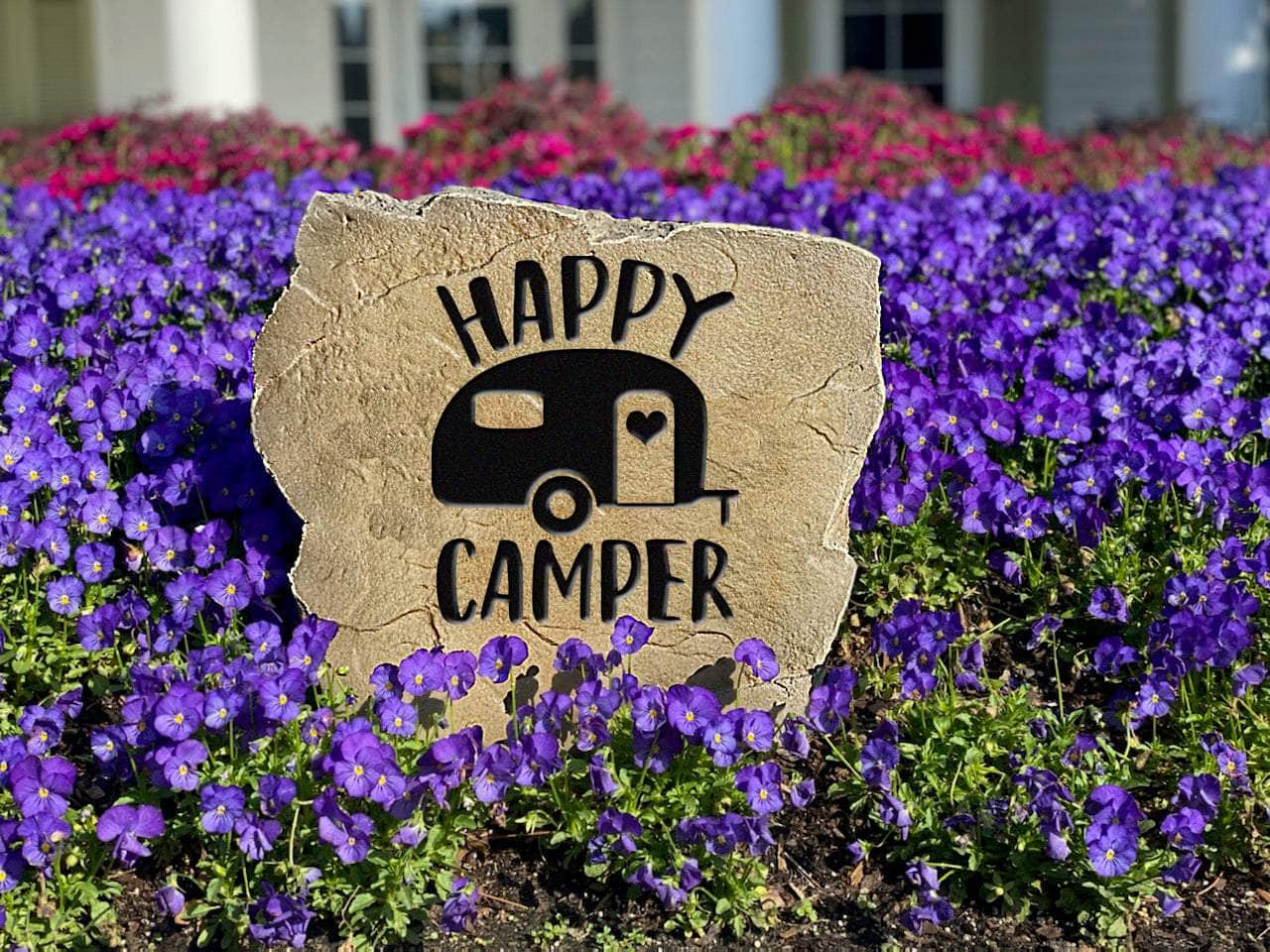 Durable engraved Happy Camper rock for yard, garden, or campsite.