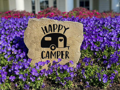 Durable engraved Happy Camper rock for yard, garden, or campsite.
