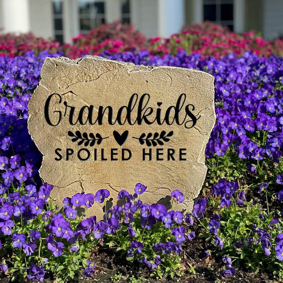 Celebrate the joy of family with a Grandkids Spoiled Here Stone designed to greet grandchildren with love. This engraved landscape stone makes a meaningful addition to gardens, patios, entryways, and front yards.