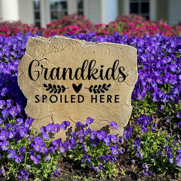 Celebrate the joy of family with a Grandkids Spoiled Here Stone designed to greet grandchildren with love. This engraved landscape stone makes a meaningful addition to gardens, patios, entryways, and front yards.