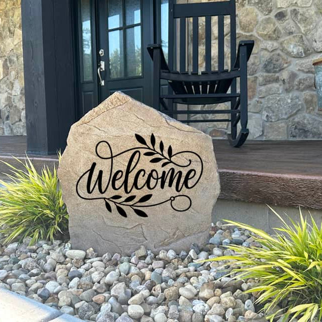 Decorative Welcome Stone with a beautifully engraved design, handcrafted to complement gardens, patios, and entryways. The permanent engraving creates a durable outdoor accent that welcomes guests with timeless charm.