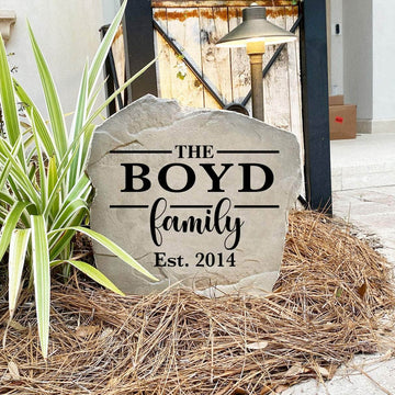 Decorative Family Name Stone featuring personalized family lettering permanently engraved into the stone surface. Perfect for gardens, patios, landscape beds, and entryways, this outdoor accent enhances curb appeal with timeless style.