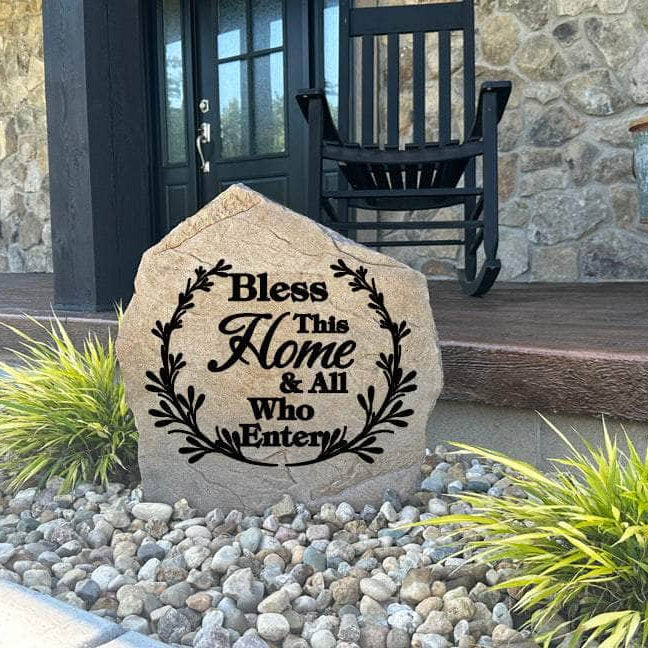 Decorative Bless This Home & All Who Enter Stone featuring a meaningful message permanently engraved into the stone surface. Perfect for gardens, patios, porches, and entryways, this outdoor accent creates a warm and inviting atmosphere.
