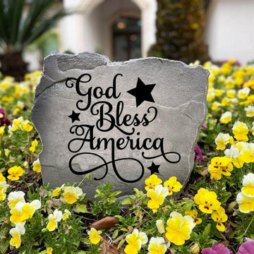 Beautiful God Bless America Stone featuring engraved patriotic artwork and an inspiring message. This decorative garden stone creates a welcoming statement while adding meaningful curb appeal to any landscape.