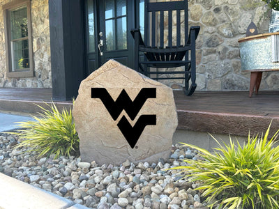 Custom landscaping rock with West Virginia University emblem